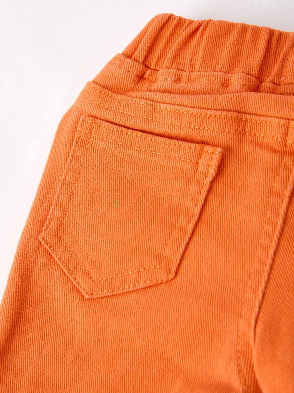 Orange Flared Elastic Jeans