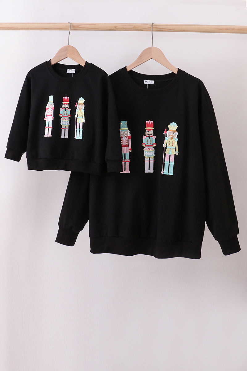 Black nutcracker embroidery mom &me top
